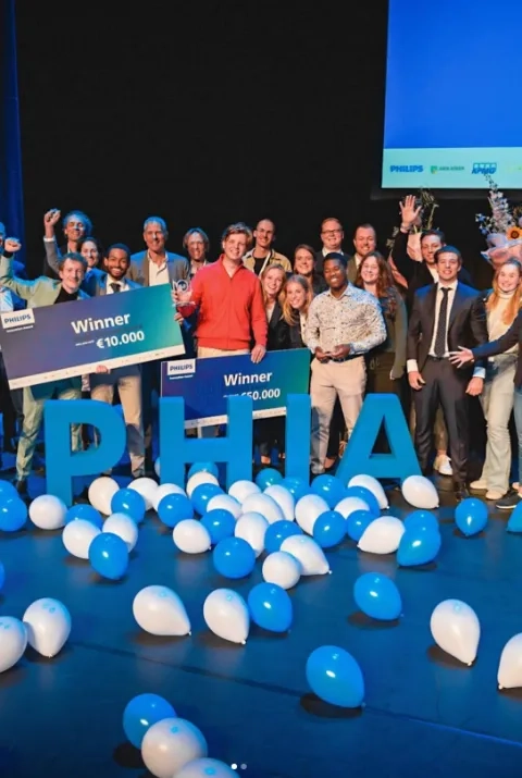 Group photo of award winners on stage